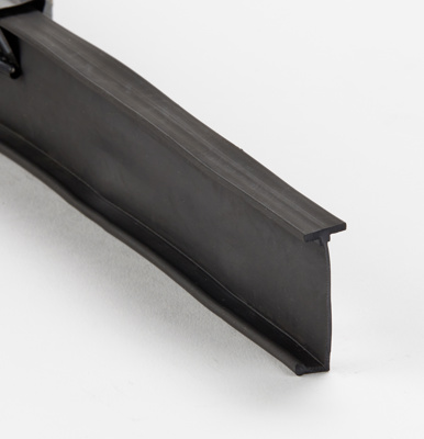 <b>Note: Sold per linear foot.</b> <br>Bottom seal for Trac-Rite doors, blade profile. Sold per linear foot. May be trimmed as needed.